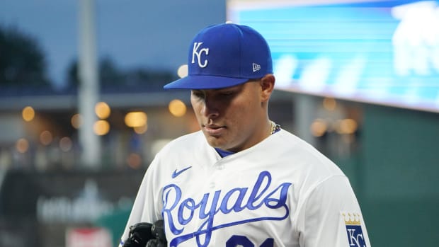 Sep 30, 2021; Kansas City, Missouri, USA; Kansas City Royals starting pitcher Angel Zerpa (61) walks from the dugout before the game against the Cleveland Indians at Kauffman Stadium. Mandatory Credit: Denny Medley-USA TODAY Sports