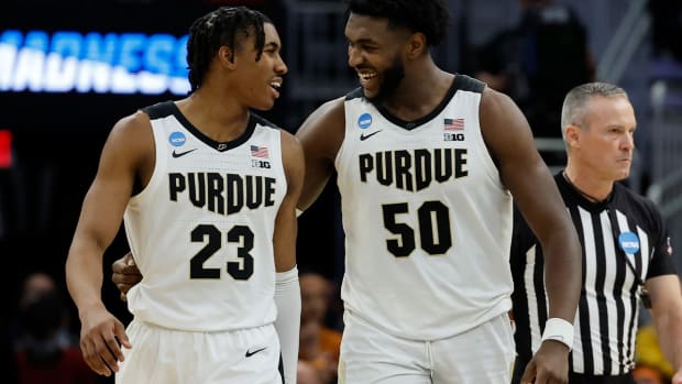 Purdue’s Jaden Ivey and Trevion Williams celebrate during the second half of a second-round NCAA college basketball tournament game against Texas Sunday, March 20, 2022, in Milwaukee. Purdue won 81-71.