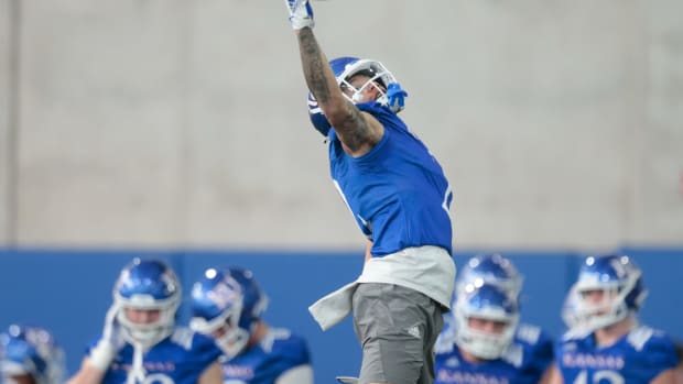 Kansas redshirt sophomore wide reciever Lawrence Arnold (2) makes a catch during practice Tuesday morning in Lawrence.