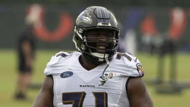 Aug 19, 2020; Owings Mills, Maryland, USA; Baltimore Ravens defensive tackle Justin Ellis (71) stands on the field during the morning session of training camp at Under Armour Performance Center.
