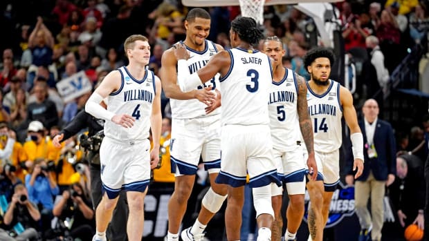 Mar 24, 2022; San Antonio, TX, USA; The Villanova Wildcats celebrates beating the Michigan Wolverines in the semifinals of the South regional of the men’s college basketball NCAA Tournament at AT&T Center