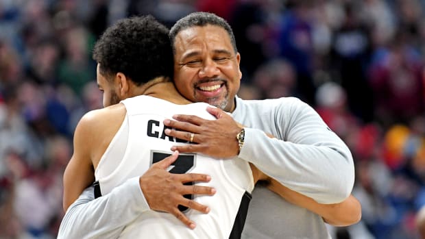 Mar 19, 2022; Buffalo, NY, USA; Providence Friars head coach Ed Cooley hugs guard Matteus Case (3) during the second half against the Richmond Spiders during the second round of the 2022 NCAA Tournament at KeyBank Center. Mandatory Credit: Mark Konezny-USA TODAY Sports