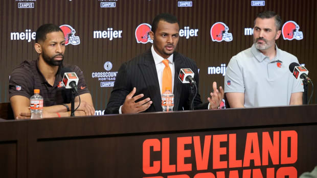 Cleveland Browns quarterback Deshaun Watson, center, takes questions from local media during his introductory press conference at the Cleveland Browns Training Facility on Friday. Watsonpress 5