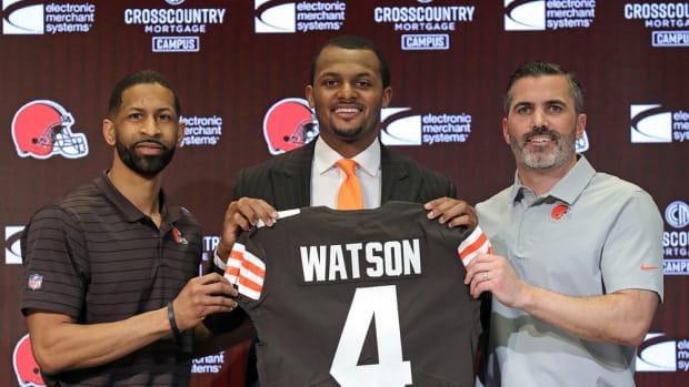 Cleveland Browns quarterback Deshaun Watson, center, poses for a portrait with general manager Andrew Berry, left, and head coach Kevin Stefanski during Watson's introductory press conference at the Cleveland Browns Training Facility on Friday. Watsonpress 11