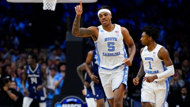 North Carolina’s Armando Bacot reacts during the first half of a college basketball game against St. Peter’s in the Elite 8 round of the NCAA tournament, Sunday, March 27, 2022, in Philadelphia.