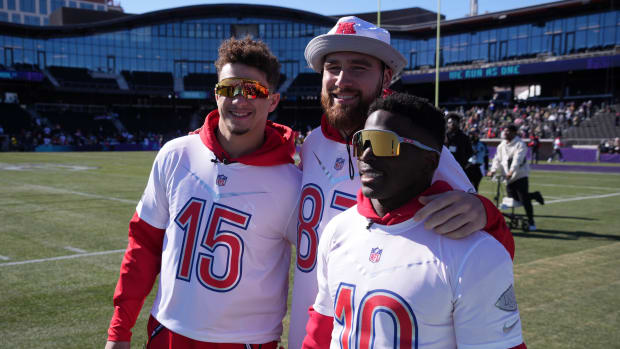 Feb 3, 2022; Las Vegas, NV, USA; Kansas City Chiefs quarterback Patrick Mahomes (15), tight end Travis Kelce (87) and receiver Tyreek Hill (10) pose Nduring AFC practice for the Pro Bowl at Las Vegas Ballpark. Mandatory Credit: Kirby Lee-USA TODAY Sports