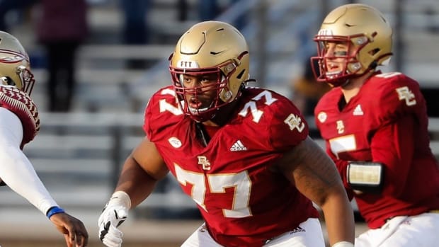 Nov 20, 2021; Chestnut Hill, Massachusetts, USA; Boston College Eagles offensive lineman Zion Johnson (77) against the Florida State Seminoles during the second half at Alumni Stadium. Mandatory Credit: Winslow Townson-USA TODAY Sports
