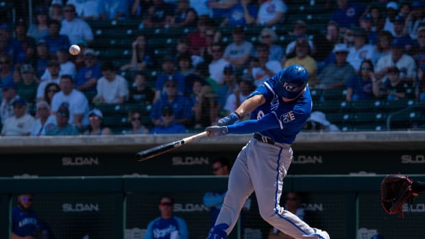 Mar 27, 2022; Mesa, Arizona, USA; Kansas City Royals outfielder Ryan O'Hearn (66) hits a home run in the first inning during a spring training game against the Chicago Cubs at Sloan Park. Mandatory Credit: Allan Henry-USA TODAY Sports