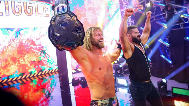 Dolph Ziggler raising the NXT championship