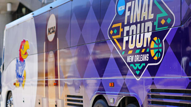 Mar 31, 2022; New Orleans, LA, USA; A detail view of the Kansas Jayhawks and NCAA branded bus wrap as the team arrives before the 2022 NCAA men's basketball tournament Final Four semifinals at Caesars Superdome. Mandatory Credit: Andrew Wevers-USA TODAY Sports