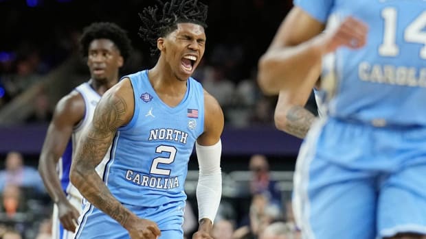 North Carolina’s Caleb Love (2) celebrates after scoring against Duke during the first half of a college basketball game in the semifinal round of the Men’s Final Four NCAA tournament, Saturday, April 2, 2022, in New Orleans.