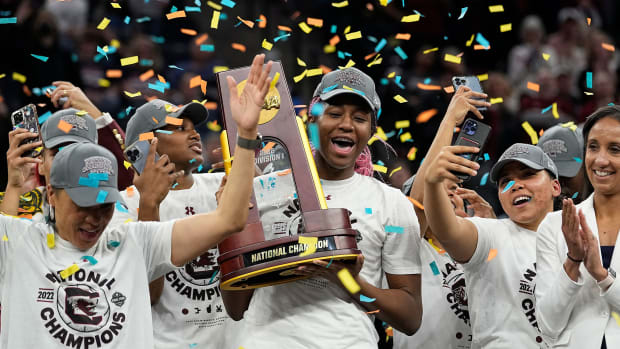 South Carolina’s Aliyah Boston holds the trophy