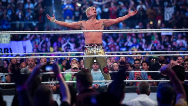 Cody Rhodes celebrates after beating Seth Rollins at WrestleMania