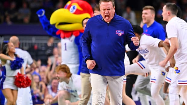 Apr 4, 2022; New Orleans, LA, USA; Kansas Jayhawks head coach Bill Self and the bench reacts after a play against the North Carolina Tar Heels during the second half during the 2022 NCAA men's basketball tournament Final Four championship game at Caesars Superdome. Mandatory Credit: Bob Donnan-USA TODAY Sports