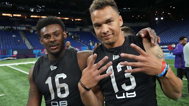 Malik Willis (left) and Desmond Ridder (QB13) pose during the NFL Scouting Combine.