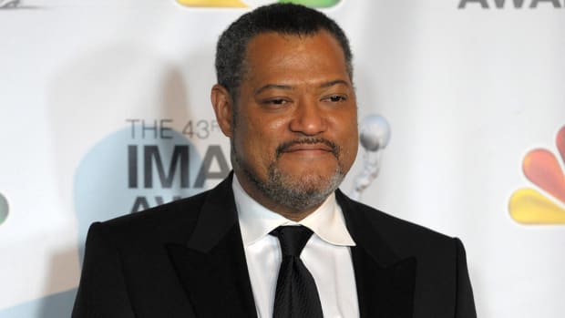 Actor Laurence Fishburne poses in the press room at the 43rd NAACP Image Awards.