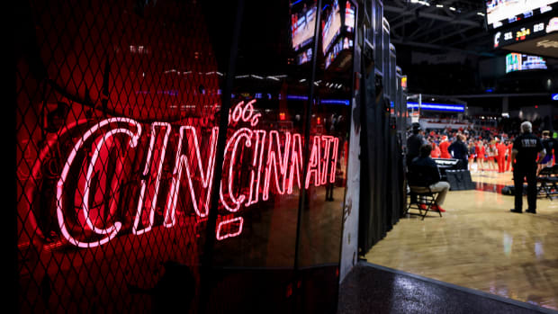 Dec 21, 2021; Cincinnati, Ohio, USA; A view of the Cincinnati neon logo during a stop in play between the Tennessee Tech Golden Eagles and the Cincinnati Bearcats at Fifth Third Arena. Mandatory Credit: Aaron Doster-USA TODAY Sports