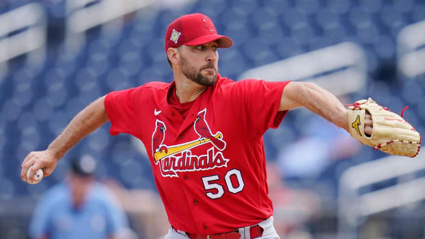 St. Louis Cardinals starting pitcher Adam Wainwright (50) pitches in the first inning of a spring training baseball game against the Houston Astros, Wednesday, March 23, 2022, in West Palm Beach, Fla.