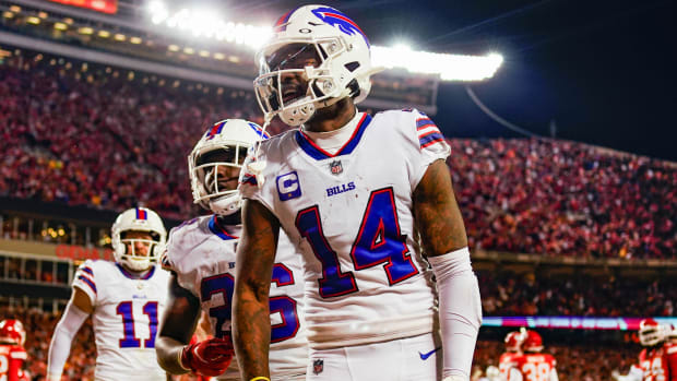 Steffon Diggs celebrates with Bills teammates after scoring a two-point conversion.