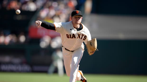 Oct 3, 2021; San Francisco, California, USA;  San Francisco Giants starting pitcher Logan Webb (62) delivers  a pitch against the San Diego Padres during the first inning at Oracle Park.