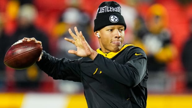 Joshua Dobbs warms up by throwing a pass before a game.