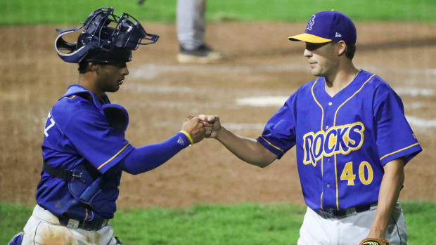 Wilmington catcher MJ Melendez (left) and catcher Collin Snider come off the field after retiring the side in the eighth inning of the Blue Rocks' 3-1 loss in the opening game of the Mills Cup Championship Series Tuesday at Frawley Stadium. Fayetteville 3 Rocks 1