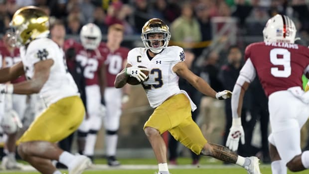 Notre Dame RB Kyren Williams carries football