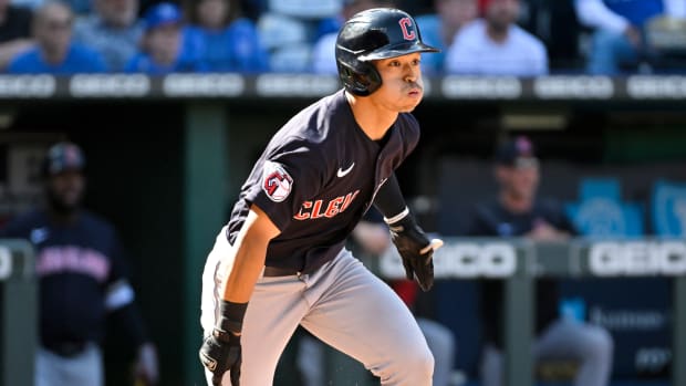 Cleveland Guardians’ Steven Kwan hits a three-RBI triple during the eighth inning of a baseball game against the Kansas City Royals, Monday, April 11, 2022 in Kansas City, Mo.