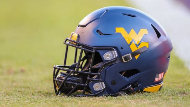 Oct 23, 2021; Fort Worth, Texas, USA; A West Virginia Mountaineers helmet is seen on the field prior to the game against the TCU Horned Frogs at Amon G. Carter Stadium.