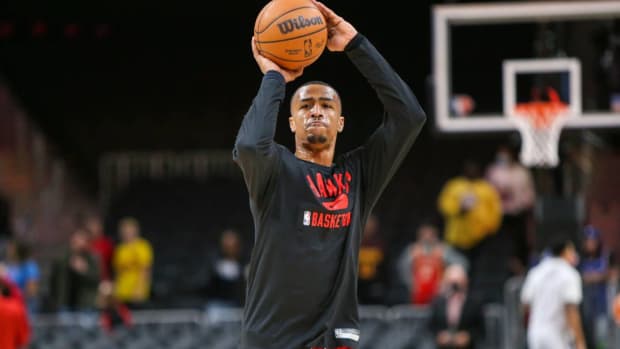 Jan 31, 2022; Atlanta, Georgia, USA; Atlanta Hawks forward John Collins (20) reacts after missing a three-point basket in the closing minute of their loss to the Toronto Raptors in the fourth quarter at State Farm Arena. Mandatory Credit: Jason Getz-USA TODAY Sports