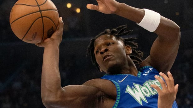 Apr 16, 2022; Memphis, Tennessee, USA; Minnesota Timberwolves forward Anthony Edwards (1) passes the ball during the first half of game one of the first round for the 2022 NBA playoffs against the Memphis Grizzlies at FedExForum. Mandatory Credit: Christine Tannous-USA TODAY Sports