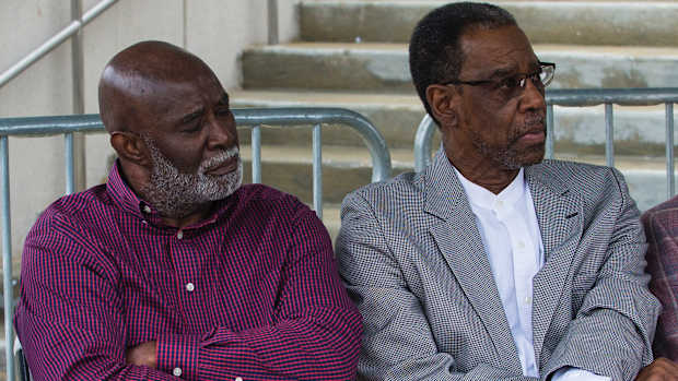 Wilbur Jackson, left, and John Mitchell listen to speakers at the John Mitchell and Wilbur Jackson Commemorative Plaque Unveiling before Alabama’s A-Day NCAA college football scrimmage, Saturday, April 16, 2022, in Tuscaloosa, Ala. The pair broke the color barrier at Alabama.