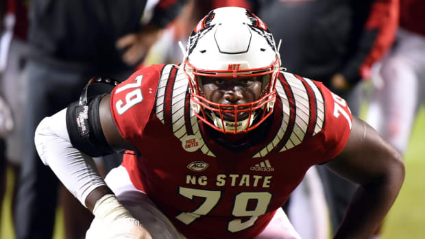 Oct 30, 2021; Raleigh, North Carolina, USA; North Carolina State Wolfpack tackle Ikem Ekwonu (79) warms up prior to a game against the Louisville Cardinals at Carter-Finley Stadium.