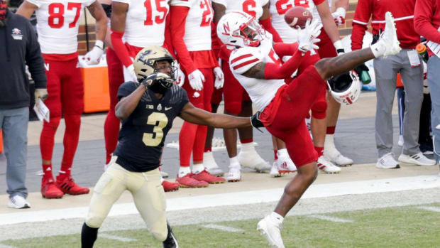 Nebraska cornerback Cam Taylor-Britt (5) goes up to attempt to intercept a pass intended for Purdue wide receiver David Bell (3) during the fourth quarter of an NCAA college football game, Saturday, Dec. 5, 2020 at Ross-Ade Stadium in West Lafayette. Cfb Purdue Vs Nebraska