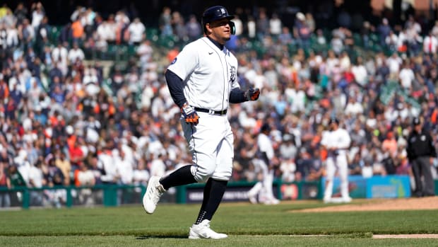 Detroit Tigers’ Miguel Cabrera runs to first base after being intentionally walked against the New York Yankees in the eighth inning of a baseball game in Detroit, Thursday, April 21, 2022.