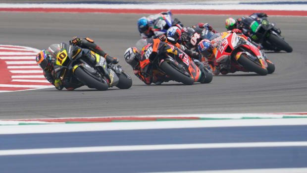 Riders including Luca Marini of Italy (10), Miguel Oliveira of Portugal (88) and Marc Marquez of Spain (93) take a turn during the recent MotoGP race at Circuit of the Americas. Photo: Chuck Burton / USA Today Sports.