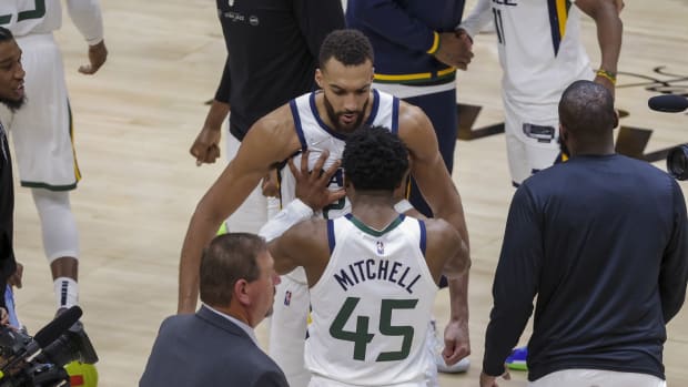 Utah Jazz guard Donovan Mitchell (45) and center Rudy Gobert (27) celebrate after the game against the Dallas Mavericksin game four of the first round for the 2022 NBA playoffs at Vivint Arena. Utah Jazz won 100-00.