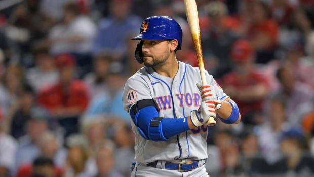 FILE - New York Mets’ Michael Conforto bats during the team’s baseball game against the Washington Nationals on Sept. 3, 2021, in Washington. Free-agent outfielder Conforto will miss the entire season after having surgery on his right shoulder. Conforto’s agent, Scott Boras, confirmed late Saturday night, April 23, in a text message to The Associated Press that Conforto had surgery last week. (AP Photo/Nick Wass, File)
