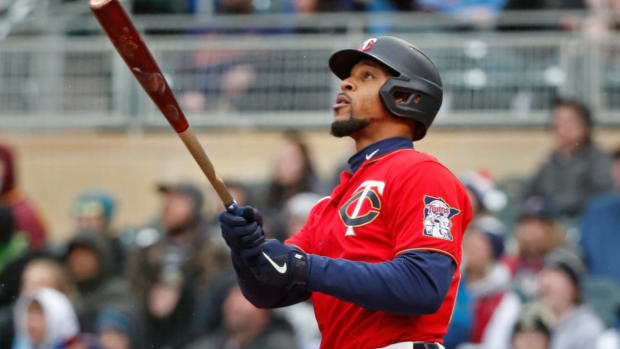 Apr 24, 2022; Minneapolis, Minnesota, USA; Minnesota Twins center fielder Byron Buxton (25) watches his three run game winning home run against the Chicago White Sox in the tenth inning at Target Field. Mandatory Credit: Bruce Kluckhohn-USA TODAY Sports