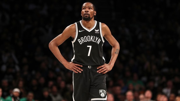 Brooklyn Nets forward Kevin Durant (7) looks up at the scoreboard in the third quarter against the Boston Celtics at Barclays Center.