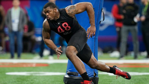 FILE - Georgia defensive lineman Travon Walker runs a drill during the NFL football scouting combine, Saturday, March 5, 2022, in Indianapolis. Walker is expected to be taken in the NFL Draft.