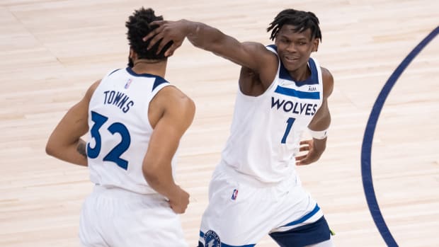 Minnesota Timberwolves forward Anthony Edwards (1) congratulates center Karl-Anthony Towns (32) against the Memphis Grizzlies.