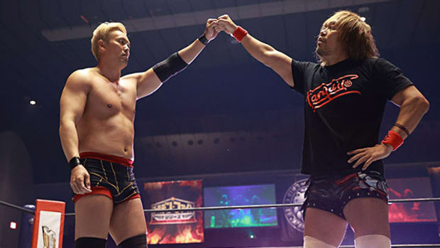 Kazuchika Okada and Tetsuya Naito bump fists after a match