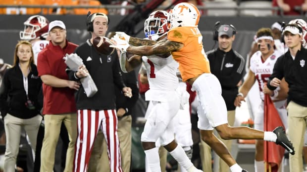 Jan 2, 2020; Jacksonville, Florida, USA; Tennessee Volunteers defensive back Alontae Taylor (2) breaks up a pass intended for Indiana Hoosiers wide receiver Whop Philyor (1) during the third quarter at TIAA Bank Field. Mandatory Credit: Douglas DeFelice-USA TODAY Sports