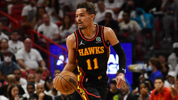 Atlanta Hawks guard Trae Young (11) brings the ball up the court during the second half of game one of the first round for the 2022 NBA playoffs.