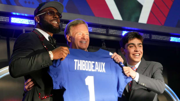 Oregon defensive end Kayvon Thibodeaux with NFL commissioner Roger Goodell and Make-a-Wish kid Sam Prince after being selected as the fifth overall pick to the New York Giants during the first round of the 2022 NFL Draft at the NFL Draft Theater.