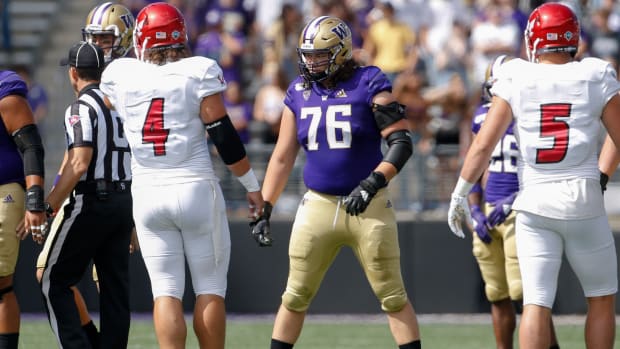 Washington Huskies offensive lineman Luke Wattenberg (76) waits for the snap during the first quarter against the Eastern Washington Eagles at Husky Stadium.