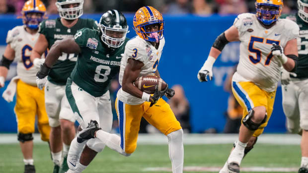 Dec 30, 2021; Atlanta, GA, USA; Pittsburgh Panthers wide receiver Jordan Addison (3) runs with the ball after a catch against the Michigan State Spartans during the first half during the 2021 Peach Bowl at Mercedes-Benz Stadium.