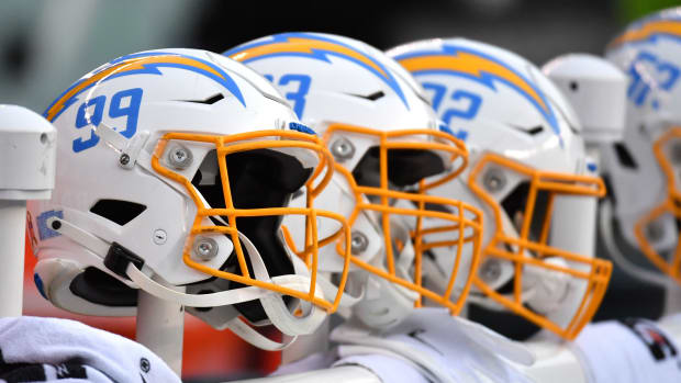 Nov 7, 2021; Philadelphia, Pennsylvania, USA; Los Angeles Chargers helmets on the bench against the Philadelphia Eagles at Lincoln Financial Field. Mandatory Credit: Eric Hartline-USA TODAY Sports