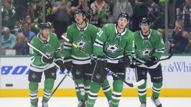 Apr 29, 2022; Dallas, Texas, USA; Dallas Stars center Joe Pavelski (16) and center Roope Hintz (24) and left wing Jason Robertson (21) and defenseman Miro Heiskanen (4) skate off the ice after Robertson scores the game winning goal against the Anaheim Ducks during the third period at the American Airlines Center. Mandatory Credit: Jerome Miron-USA TODAY Sports